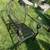Bronze painted glass top patio set with six stackable chairs 9 thumbnail