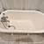 antique clawfoot tub with filler ,1929, 55x30x22H 2 thumbnail
