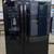 GE - 25.3 Cu. Ft. Side-by-Side Refrigerator External Ice/Water Black 1 thumbnail