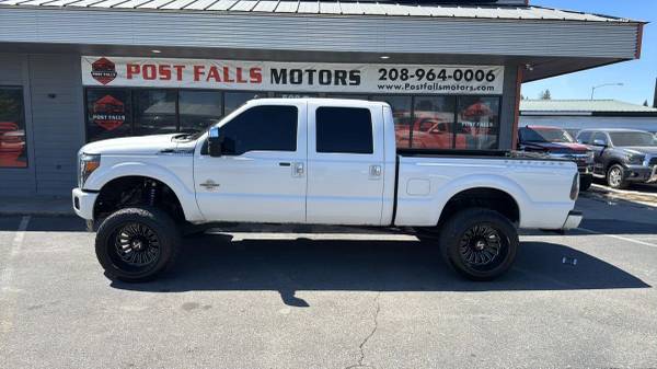 POST FALLS MOTORS. COM 2015 Ford F250 Super Duty Crew Cab Platinum Pic 1