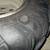 2003 Suzuki Vinson 500 Front 4/110 Rim Wheel 25X8-12 BAD Tire 2 thumbnail