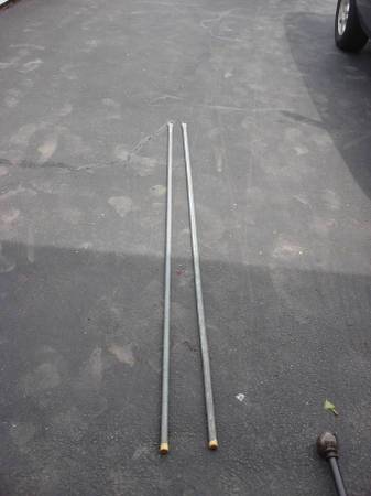 PAAIR OF METAL CLOTHES LIN E BARS 1