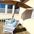 Quality Wicker Conversation Bench With Middle Table, cushions and umbr 2 thumbnail