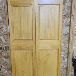 Bifold Door Clear Pine Stained - New - 36 by 79 1