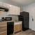 Exercise Room, Desk, Kitchen, Fax Machine 1 thumbnail