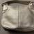 Gold pebble leather Cole Haan bag adjusts handbag to shoulder 2 thumbnail