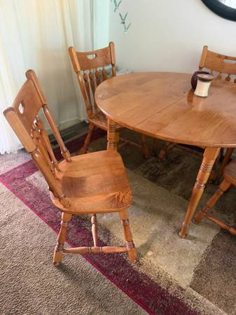50’s solid wood dining table w/4 chairs and 2 leafs 1
