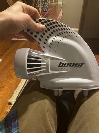 Boost Fin, 4 adapters, Control watch, charger, and tool 1