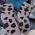 Fuzzy socks, gloves, and change purse. 1 thumbnail