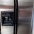 Whirlpool Stainless Steel side by side fridge freezer 1 thumbnail