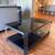 Coffee Table, glass surface, sturdy metal frame. Rolling. 1 thumbnail