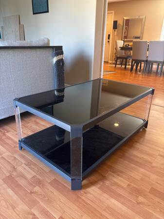 Coffee Table, glass surface, sturdy metal frame. Rolling. 1