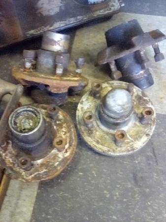 4) trailer hubs 5 lug, each 1500lbs. rated, buddy bearings, lug nuts 1