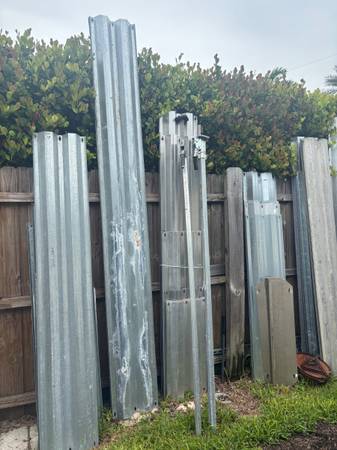 5- 115” STEEL HURRICANE PANELS/ SHUTTERS 1