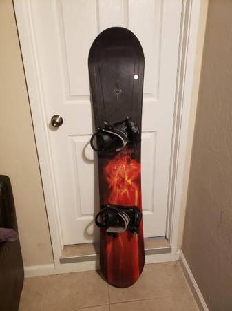 Ltd 157cm Snowboard and bindings 1