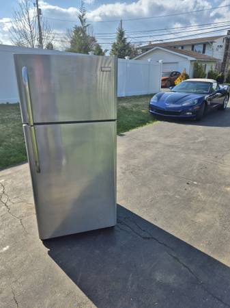 Frigdaire stainless steel refrigerator with ice maker 1