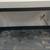 Black laminate table 55" x 23" 2 thumbnail