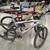 (2) MOTIV Vorteh/Vortex mountain bikes with hitch carrier 1 thumbnail