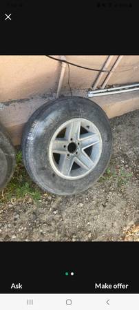 Chevy Camaro rims 15 in pair. yes I have it firm not a penny less 1