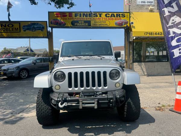 2012 Jeep Wrangler Unlimited Sahara 4x4 - $12.995 (Staten Island)63476897576323121