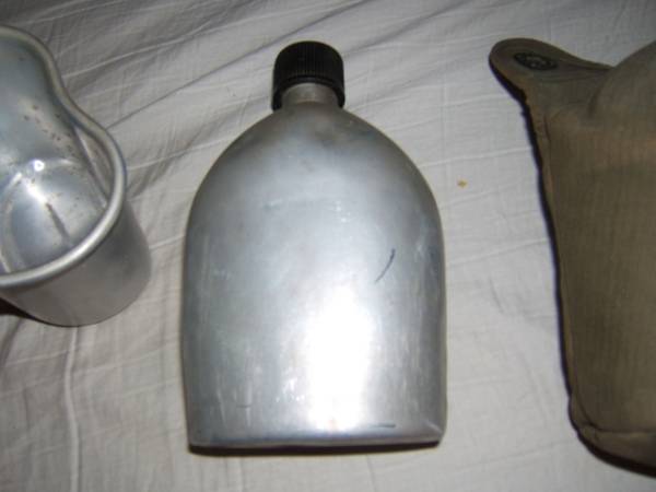 WW2 U.S. Canteen dated 1945 on canteen and cover 1
