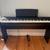 Yamaha P-125 Piano with Stand 1 thumbnail