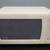 GE GTE18GTHERWW Top-Freezer Refrigerator and microwave 2 thumbnail