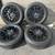 2024 Toyota Tundra 20 inch black alloy stock rims with new 1 thumbnail
