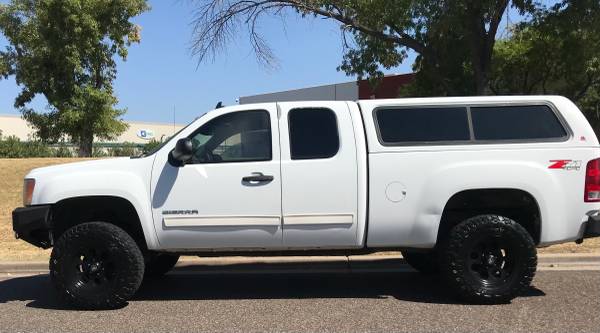 Sierra 2012 GMC 4x4 1500 SLE elevado (Chevy Silverado) Chevrolet - $9.000 (Phoenix)63616927121793124