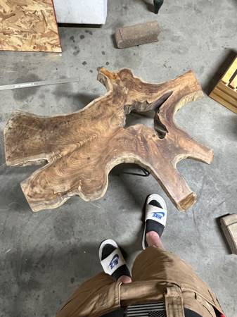 Live edge teak tables and floating shelves. 1