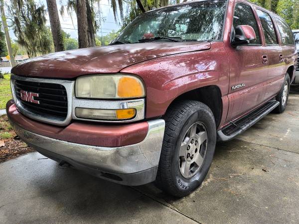 Suburbano Chevy 04 v8 5.3, con una tonelada de música, 6-15 pulgadas de subgraves, 8-6 pulgadas de agudos en una consola metálica - $5.500 (Jacksonville, Florida)63470246971393121