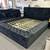 Queen bed frame with storage in black 1 thumbnail
