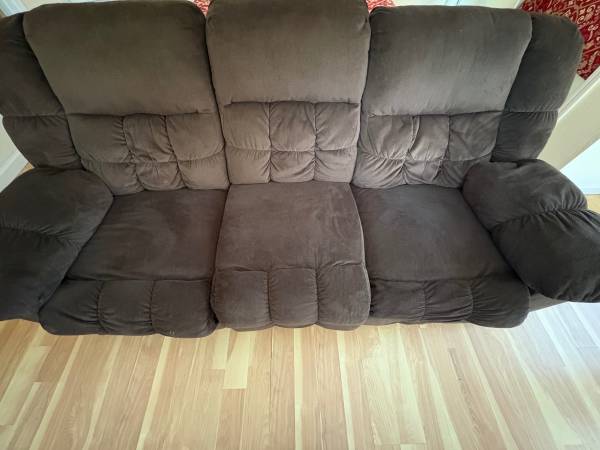 Large used sofa in good condition with recliner on each end 1