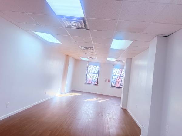 Beautiful tree-lined office space open layout church view elevator 1