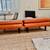 Crate and Barrel: PETRIE TUFTED LEATHER MID-CENTURY OTTOMAN /s 2 thumbnail