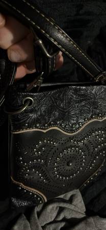 Two different black purses, two different styles 1