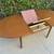 Mid Century Modern Teak Oval Butterfly Leaf Dining Table. 1 thumbnail