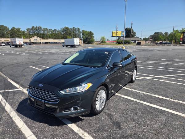 2014 ford fusion  hybrid - $2,995 (Marietta)63620880786689122