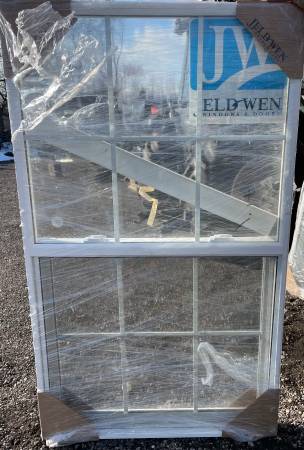 New 35.625x59.8 JeldWen single hung window, 3x2 grids 1