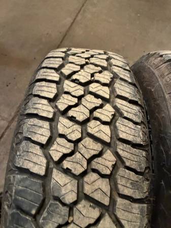 275   75   16 snow tires 1