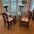 Like New Crate and Barrel Dining Table - Brass Base/Glass Top + Chairs 1 thumbnail
