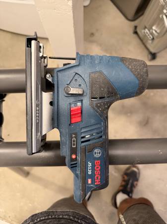 12V jigsaw comes with extra blades, battery and charger $50 1