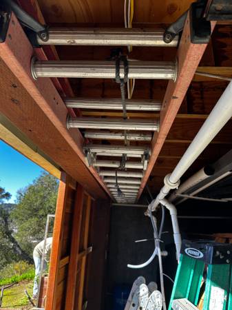 werner 24 ft extension ladder with stabilizer arms and pads 1