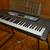 Yamaha EZ-200 61-Key Full-Size Touch Sensitive Lighted Keyboard &Stand 3 thumbnail