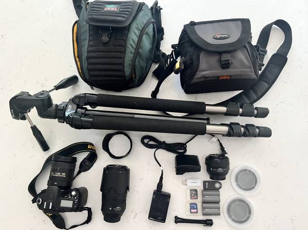 Nikon D90 DSLR Camera with three lenses, bags, tripod, filters, flash 1