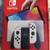 Brand New Nintendo Switch OLED (White) with carrying case 1 thumbnail