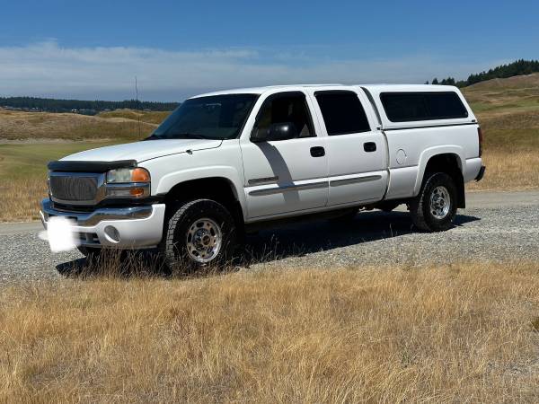 2005 Gmc sierra 2500hd crew cab 4x4 100k millas - $9,950 (Lakewood)63617898567555120