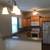 The kitchen will come equipped with the refrigerator 1 thumbnail