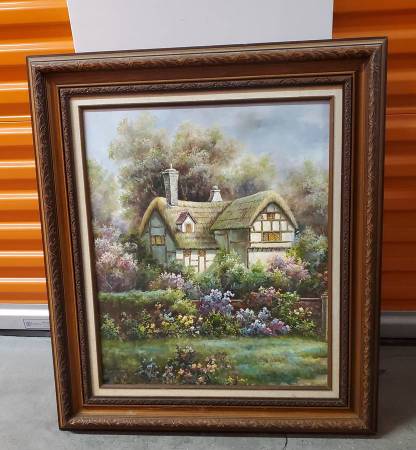 Large framed painting of a cottage scene. Signed Armstrong?. 1