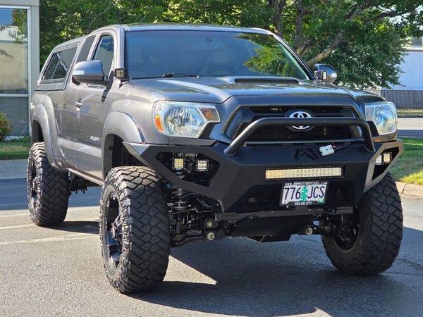 2015 Toyota Tacoma 4x4 con cama larga, personalizada / Elevación de 4 pulgadas / 63,000 millas - $31,995 (+ M M Investment Cars - Portland)63484839149443121